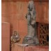 Monkeys beside an Indian statue